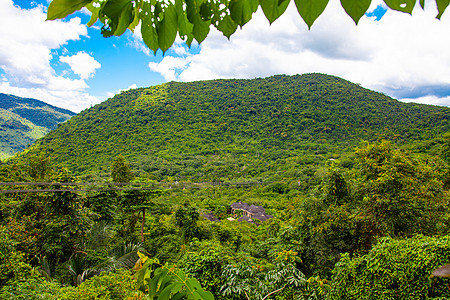 三亚槟榔谷中国三亚海南空中风景 天空和云彩蓝色花园假期天际森林地标旅行世界爬坡地平线旅游背景