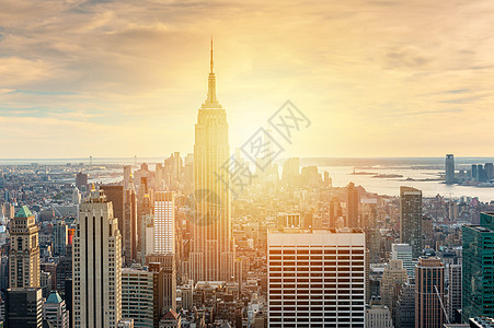曼哈顿日落建筑学摩天大楼建筑城市阳光旅游天线天空商业地标图片