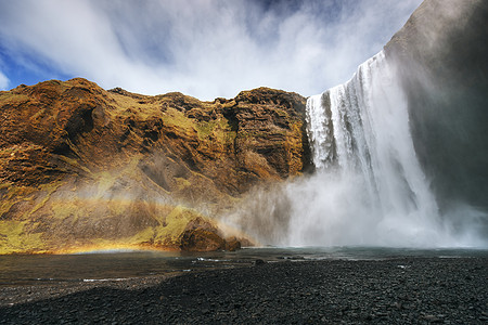 冰岛南部靠近冰岛的Skogafos大瀑布假期火山彩虹活力溪流旅行天空瀑布悬崖荒野图片