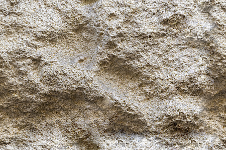 无缝无密封的米地岩石岩石墙背景纹理图片