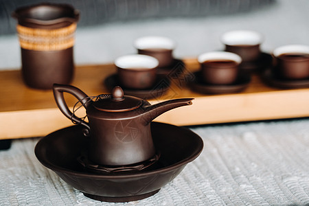 准备和一家大公司举行茶茶仪式植物茶杯餐具杯子开水礼仪传统茶壶太阳神浓茶图片