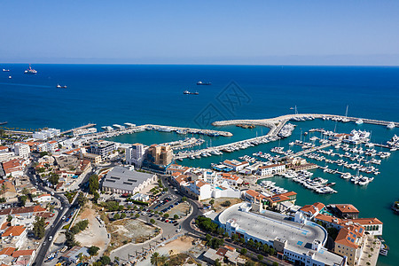 利马索尔新码头的空中视图阳光建筑天蓝色天际景观场景天线城市码头地平线图片