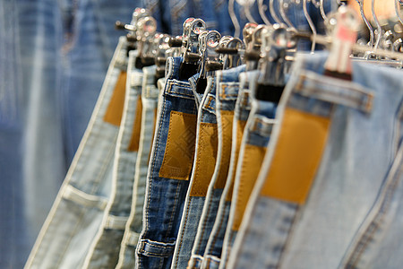 一套蓝色牛仔裤服饰口袋纺织品棉布牛仔布服装材料标签接缝品牌图片