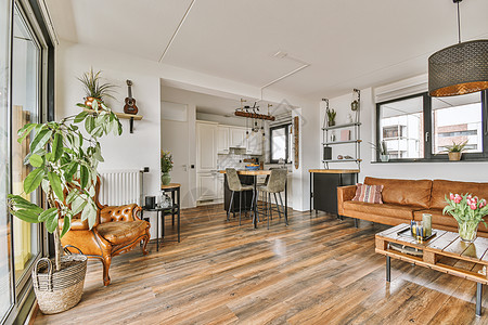 现代公寓客厅 有开放厨房沙发财产住宅桌子学习房间阁楼长椅房地产木地板图片