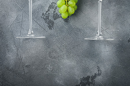 葡萄酒杯 灰石底面 顶层视野平板 有复制文本的空间背景农业标签植物藤蔓饮料灰色收成水果玻璃图片