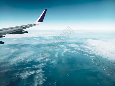 翼云天空大气飞机飞机车辆航空公司航空飞行蓝云图片