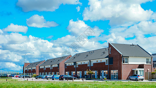荷兰郊区拥有现代家庭住宅 在荷兰新建现代家庭住宅邻里房屋建筑学生态奢华街道公寓蓝色房子窗户图片