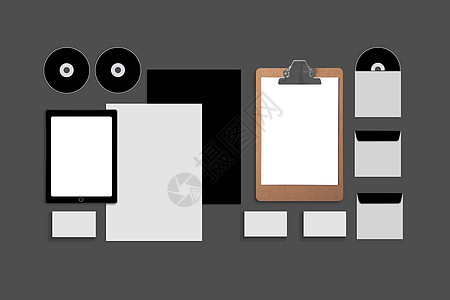 空白公司 ID 设置在灰色背景上 包括名片 文件夹 平板电脑 信封 a4 信笺 笔记本 闪光灯 铅笔 cd 盘和智能手机办公室嘲背景图片