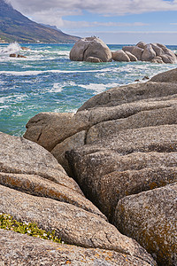 西开普坎普斯湾的岩石海岸线 海景  坎普斯湾 桌山国家公园 开普敦 南非阳光卵石摄影边缘海浪蓝色风景假期太阳河岸图片