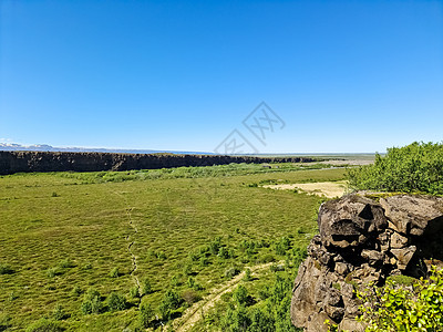 观察冰岛的峡谷风景悬崖岩石远足石头蔬菜公园荒野地标蓝色溪流图片