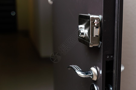 装甲家门的高度安全锁门把手玻璃入口酒店房间生活金属建筑学钥匙墙纸图片