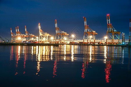 Oguro hea港的夜景海洋重机血管起重机点亮照明港口贸易货船渡船图片