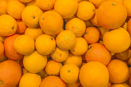 橙子和橘子背景柑橘仁成熟水果桔子热带甜点叶子食物太阳团体饮食果园农业收成花园图片