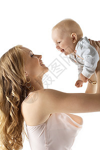 美丽的年轻母亲 带着微笑的婴儿在手图片