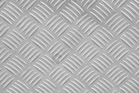 钻石型的金属地板板盘子墙纸钻石菱形合金材料床单拉丝立方体划痕背景图片