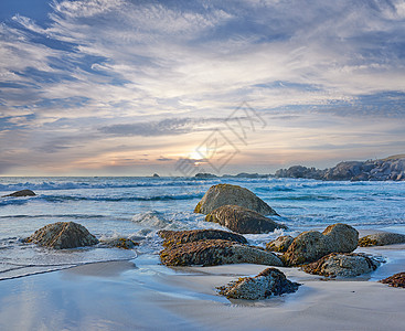 梦幻般的海滩  开普敦坎普斯湾 美丽的海滩和岩石  坎普斯湾地平线环境季节日落生态阳光营地冲浪蓝色日出图片