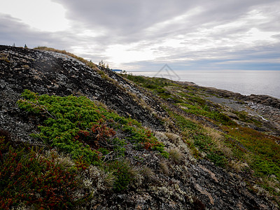 白海的风景与岩石天空悬崖海岸矿物海滩蓝色石头海岸线支撑海洋图片