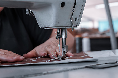 缝织机生产女裁缝针线活工人爱好服装业商业制造业作坊织物图片