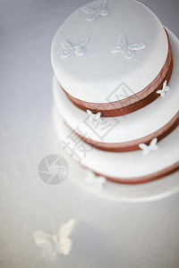 结婚蛋糕蝴蝶婚礼背景图片