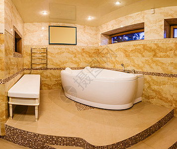 室内现代房 有大理石砖和按摩浴缸的浴室图片