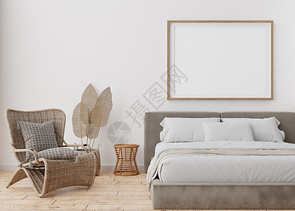 家具海报背景现代卧室白墙上的空相框 模拟波西米亚风格的室内装饰 为您的图片 海报免费复制空间 床 藤制扶手椅 镶木地板 3D 渲染背景