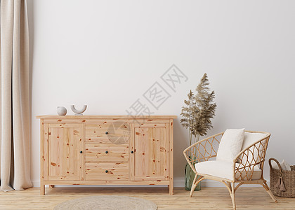 现代客厅的空白墙 模拟斯堪的纳维亚 波西米亚风格的室内装饰 免费复制您的图片 文本或其他设计的空间 餐具柜 藤制扶手椅 蒲苇 3图片