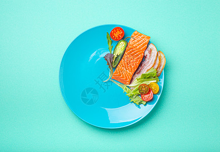 断断断断续续的节食低碳脂高脂肪饮食概念平板固定 蓝盘上健康食品碳水糖尿病饥饿盘子损失代谢战略桌子午餐排毒图片