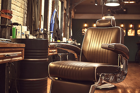 理发店的棕色皮椅头发奢华胡须沙龙工作店铺潮人男人配件椅子图片