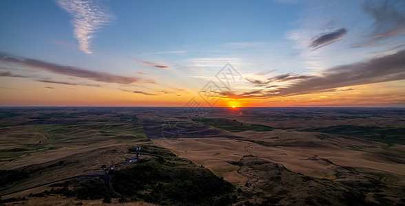 华盛顿东部松散地区的太阳落到地平线下方风景场地旅游农场乡村旅行绿色农田日落麦田图片