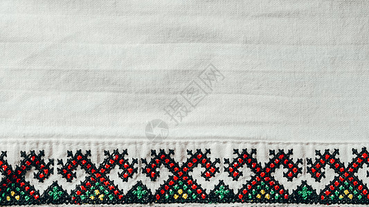 乌克兰衬衫上手工制作的刺绣几何装饰品乌克兰人古老的传统真服多彩色屏幕保护器vyshyvanka创造力标识棉布服饰生产宏观材料示范图片