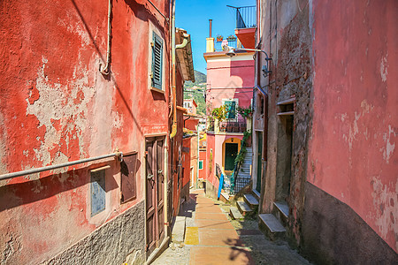 意大利利古里亚的街爬坡地方人行道建筑悬崖乡村城市海滩院子天空图片