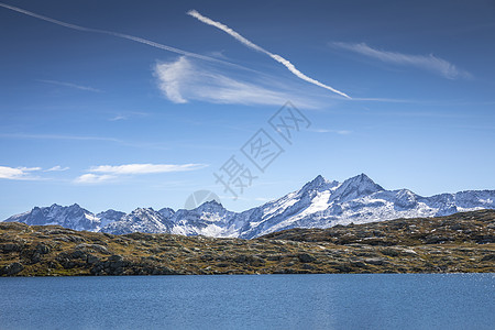 瑞士的Oberalp山口高山湖文化天堂假期风景天空日出旅游水面蓝色水库背景