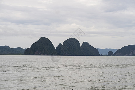 张恩加湾旅行蓝色白色戏剧性海洋公园天空游客热带海岸图片