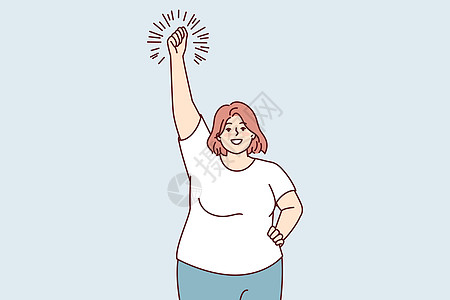 取笑大块头女人的热身手举起手来 引领积极生活方式图片