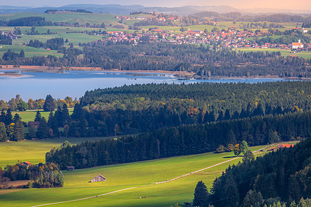 德国巴伐利亚州巴伐利亚阿尔卑斯的佛根西湖日落天空日出林地公共公园森林农场旅游松树摄影图片