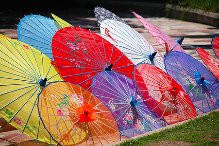 伞颜色中国多彩无色的中国粗体景点蓝色手工业展示条纹艺术节日收藏日光紫色背景