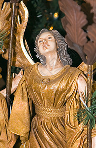 圣诞天使雕像季节金子翅膀精神长袍宗教信仰假期高清图片