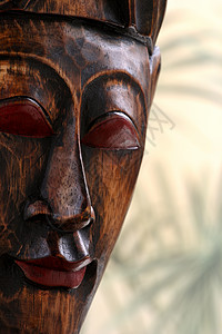 木制面具雕刻热带艺术背景图片