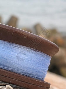 鱼线紧闭尼龙运动细绳卷轴棕色工具金属蓝色图片