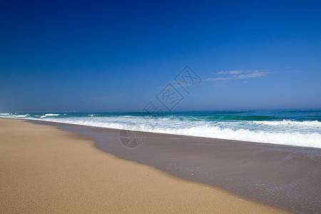 海滩地平线海岸假期波浪旅游海浪太阳蓝色天空海洋图片