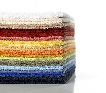 毛巾堆积多色棉布浴缸柔软度生活方式沙滩巾橙子折叠家庭生活洗衣店设备图片