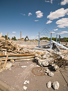 拆除的居民区风光作坊机器金属贫困天空电缆自然灾害蓝天城市图片