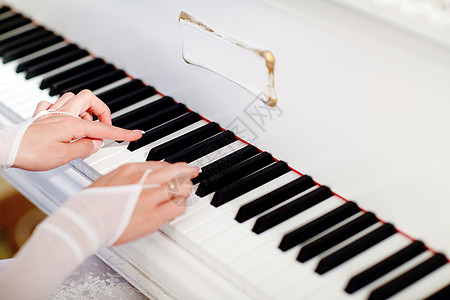 教钢琴弹钢琴旋律玩家乐器新娘键盘艺术家手指按钮教学韵律背景