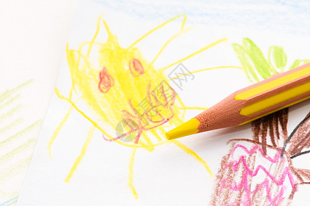 铅笔卡通铅笔和儿童绘画友谊调色板艺术太阳蓝色蜡笔彩虹孩子橙子宏观背景