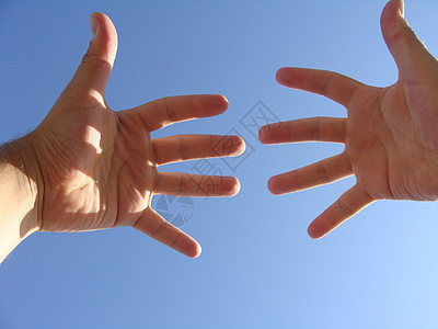 双手手指棕榈希望天堂手腕手势天空宗教皮肤绿色图片