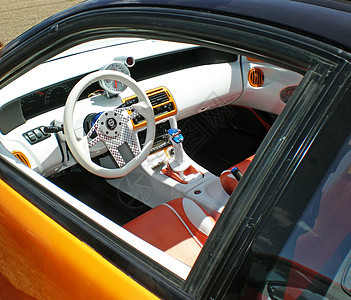 运动车里面的沙龙跑车技术运输敞篷车奢华橙子车辆马力展示成功图片