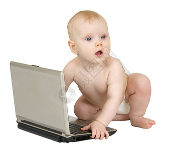白着笔记本电脑的婴儿背景图片