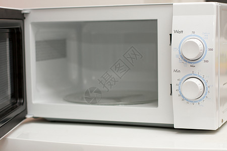 微波白色厨房器具房子物品时间电子产品刻度食物烤箱图片