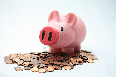 养猪银行和硬币银行业白色储蓄房子粉色货币投资笔记商业戏剧图片