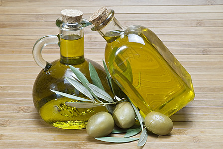 橄榄油瓶子处女黄色橄榄枝树叶产业农业生活食物水晶图片
